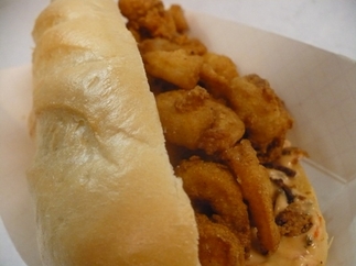 Cooked To Order Fresh<br>Shrimp or Oyster Po-boy<br>served on a 6 inch baguette<br>with Smokey Chipotle Remoulade Sauce